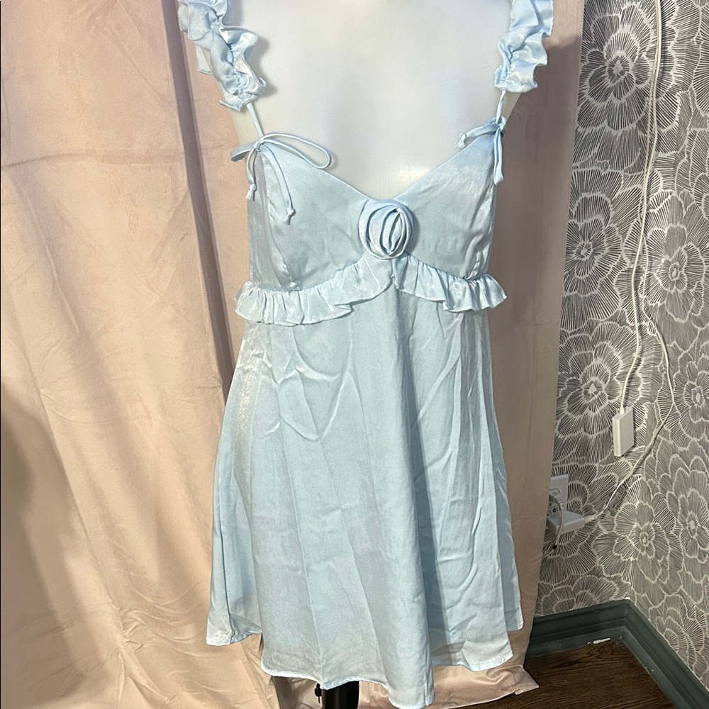 Baby blue dress with a rose in the center